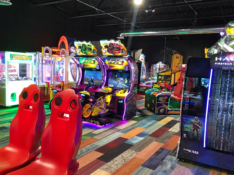 Racing and shooting arcade machines including motorcycle simulators at Jax 60 in Jackson, Michigan