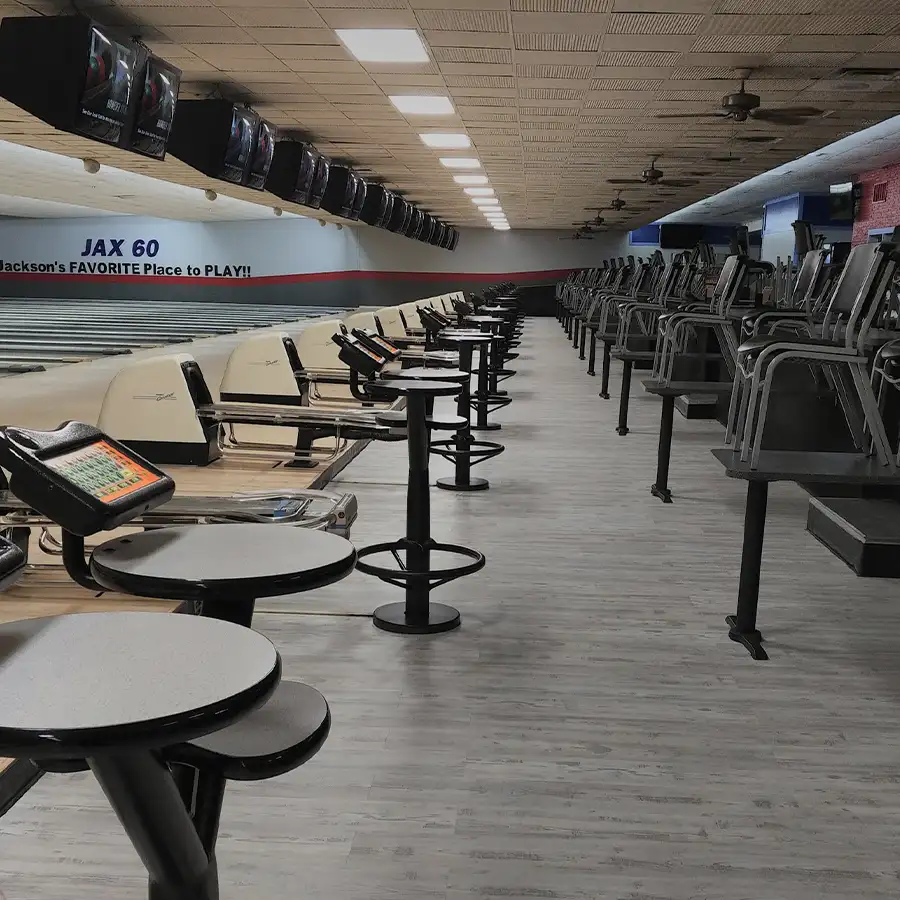 Bowling lanes with "Jackson's Favorite Place to Play" wall sign at Jax 60 in Jackson, Michigan
