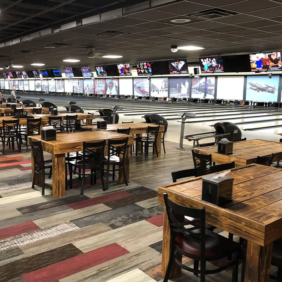 Dining tables with tissue boxes overlooking the bowling lanes at Jax 60 in Jackson, Michigan