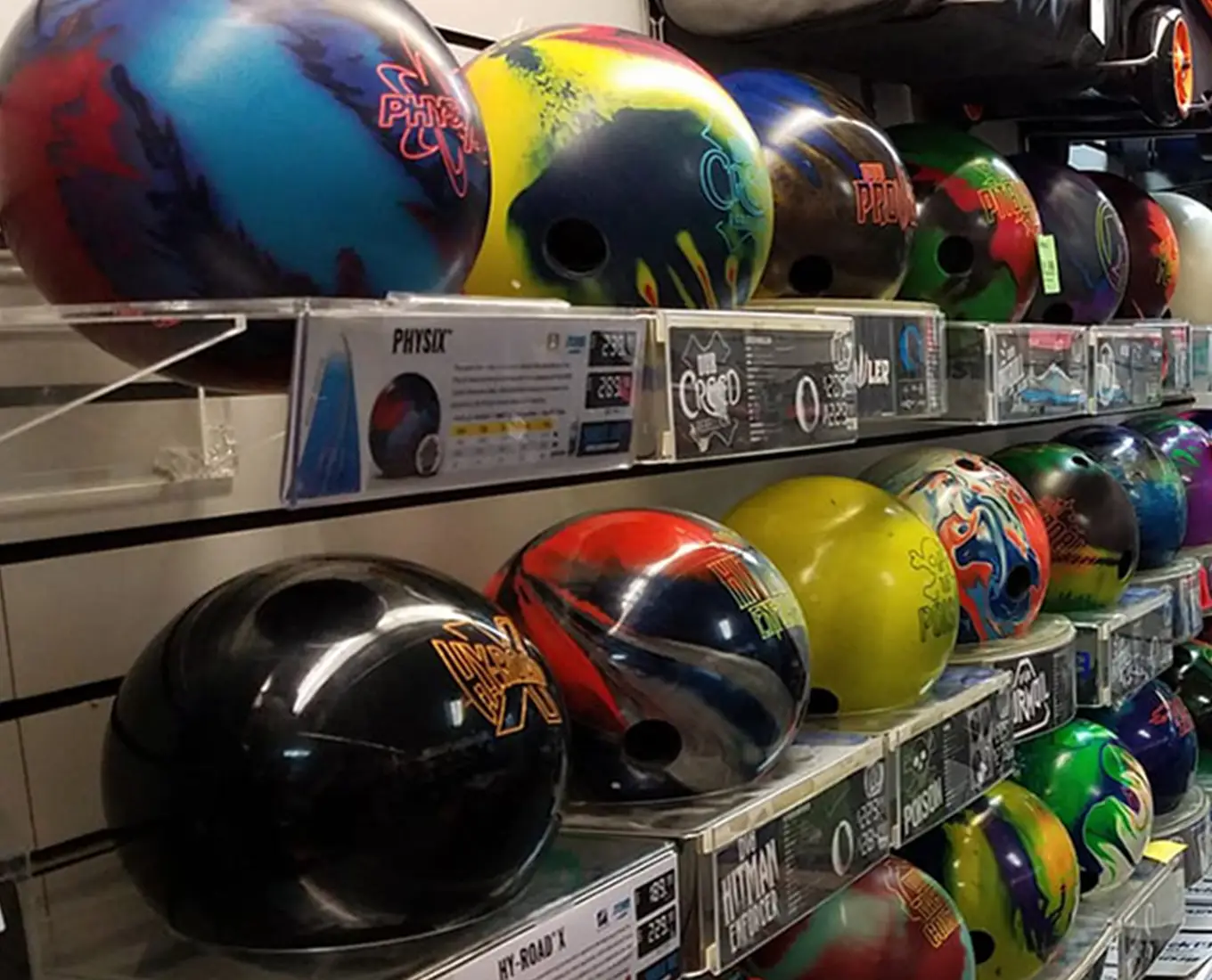 Shelves of colorful bowling balls for sale in the pro shop at Jax 60 in Jackson, Michigan