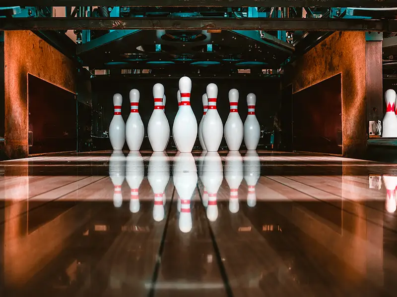 Freshly set bowling pins reflected on the lane at Jax 60 in Jackson, Michigan